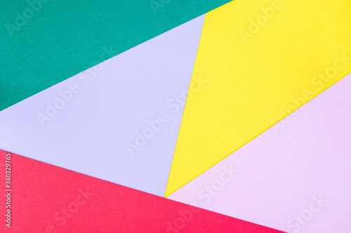 Abstract blank background for template, geometrical pattern made from green, violet, pink, red and yellow paper, horizontal, copy space