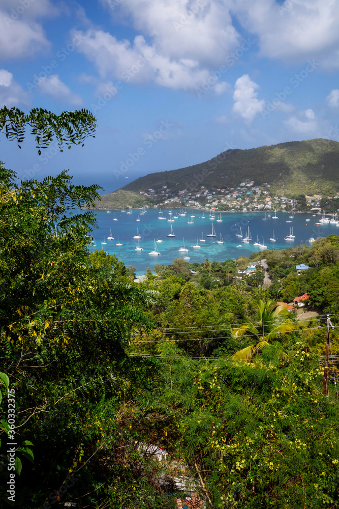 Sail boats in the Caribbean harbor of Bequia Island in Saint Vincent and the Grenadines 