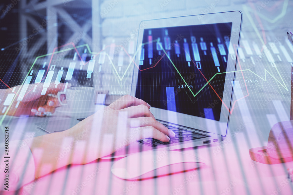 Double exposure of woman hands typing on computer and forex chart hologram drawing. Stock market analysis concept. Double exposure of woman hands typing on computer and forex chart hologram drawing. Stock market analysis concept.