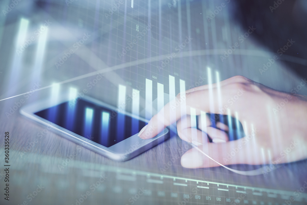 Double exposure of forex chart sketch hologram and woman holding and using a mobile device. Financial market concept. Double exposure of forex chart sketch hologram and woman holding and using a mobile device. Financial market concept.