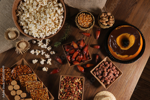 Food group from Festa Junina, a typical Brazilian party, holiday event in June: Pe de moleque, peanuts, cake, sweets, popcorn and pine nuts © CassianoCorreia