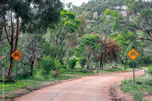 cycling signs on dirt road in the you yangs national park photo