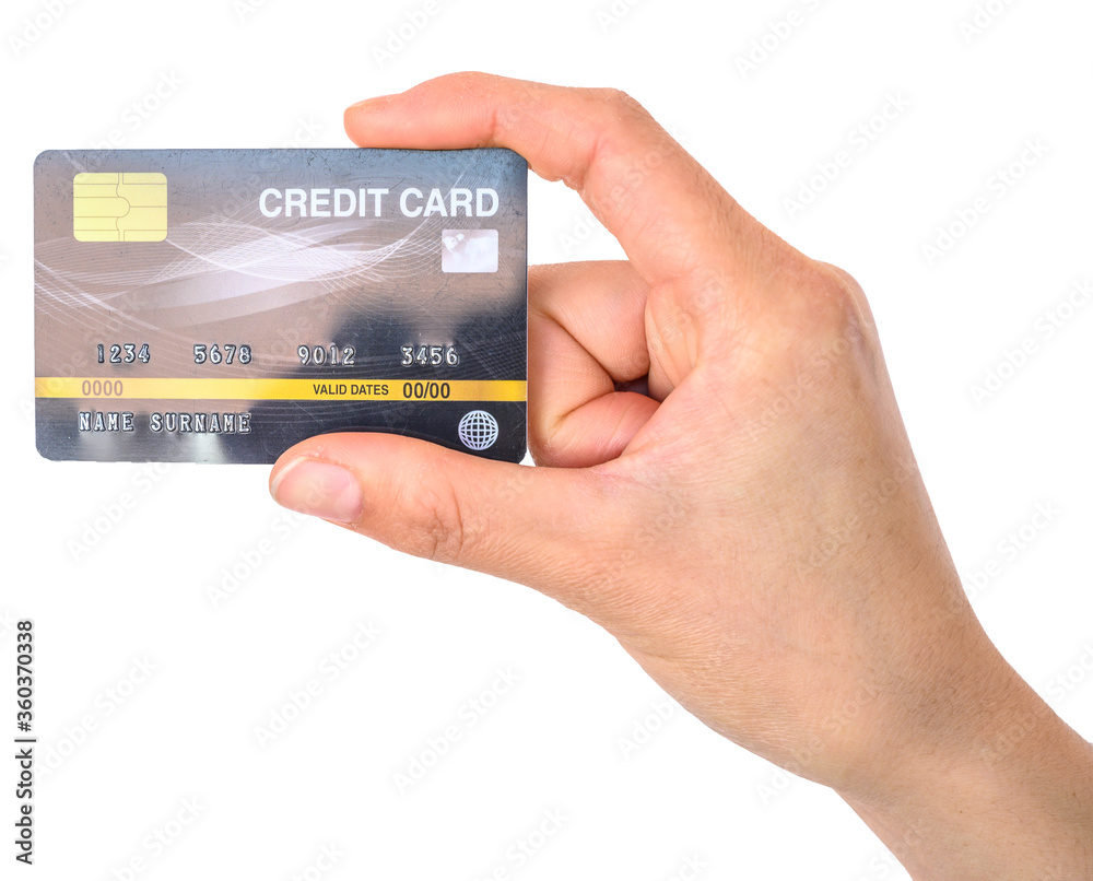 Someones hand holding credit card isolated on white background. Someones hand holding credit card isolated on white background.