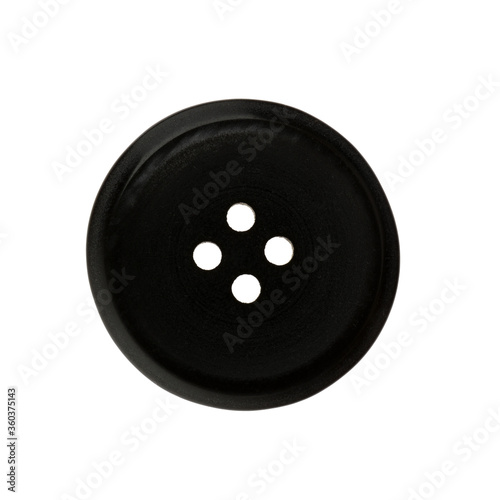 Black plastic sewing button isolated on white