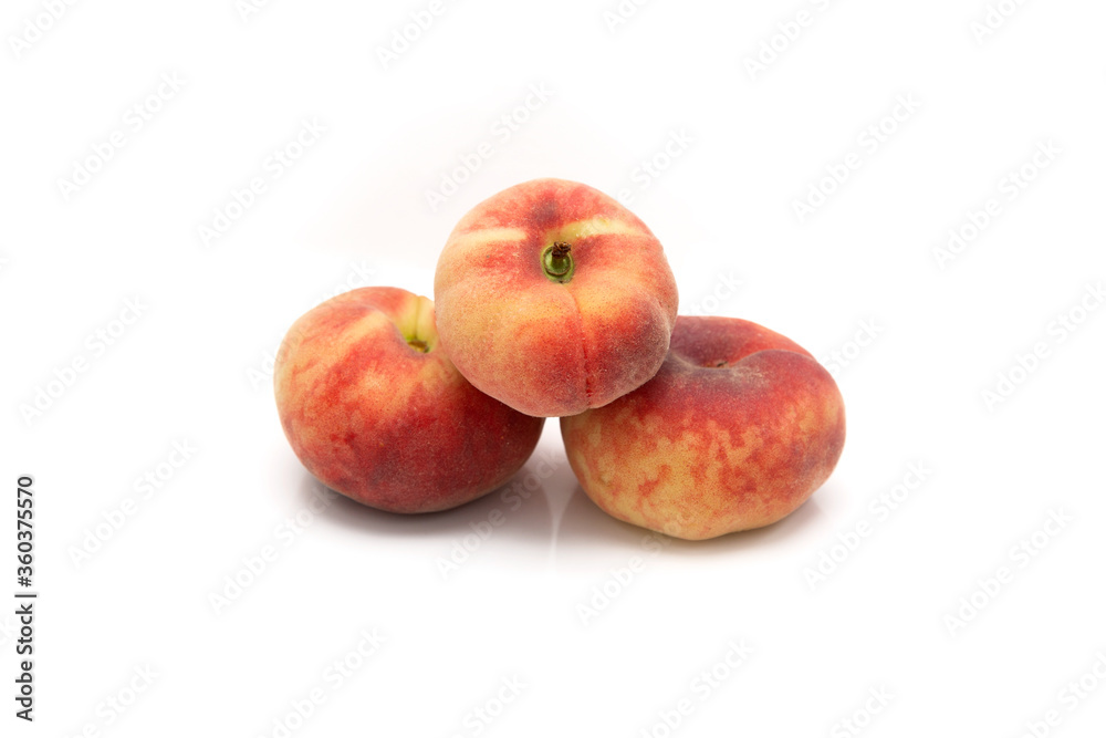 flat or flattened peach on a white background flat or flattened peach on a white background