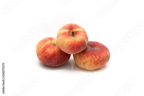 flat or flattened peach on a white background