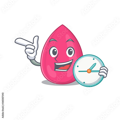 A picture of cheery makeup sponge holding a clock