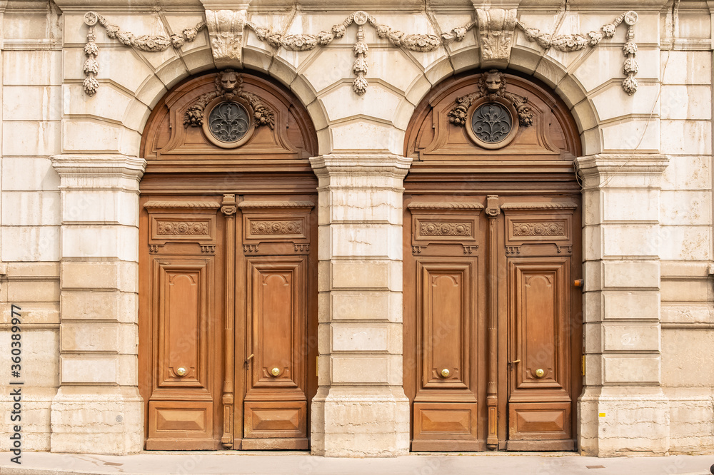 Lyon, two old wooden doors, typical building in the south of France
