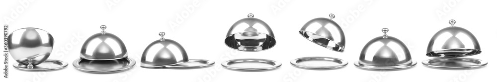 Trays with cloches on white background Trays with cloches on white background