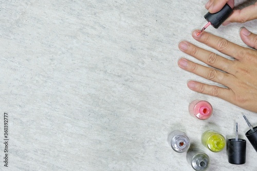 Nail painting work by hand, top view