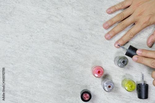 Nail painting work by hand, top view