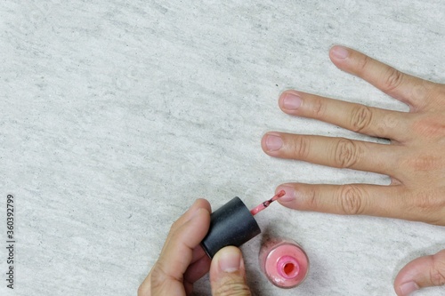 Nail painting work by hand, top view