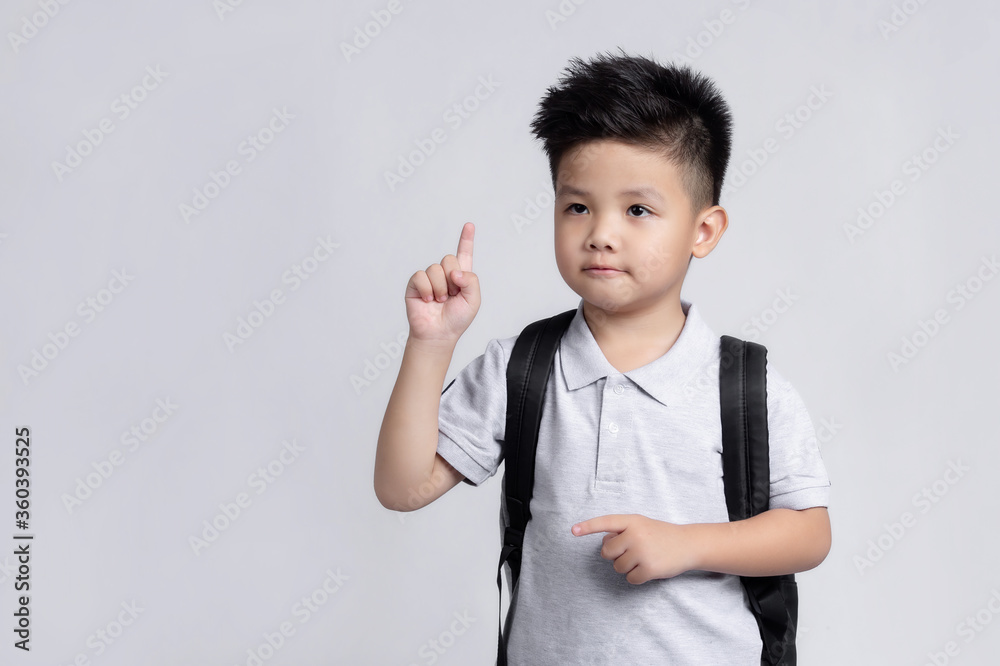 Cute little child with backpack having fun. School concept. Back to School Cute little child with backpack having fun. School concept. Back to School