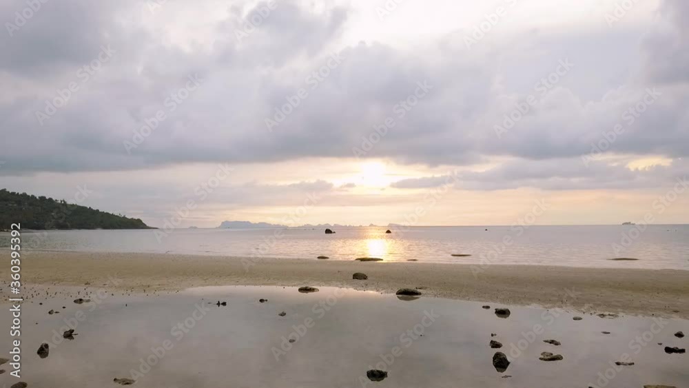 sunset on the beach from koh samui island,thailand sunset on the beach from koh samui island,thailand