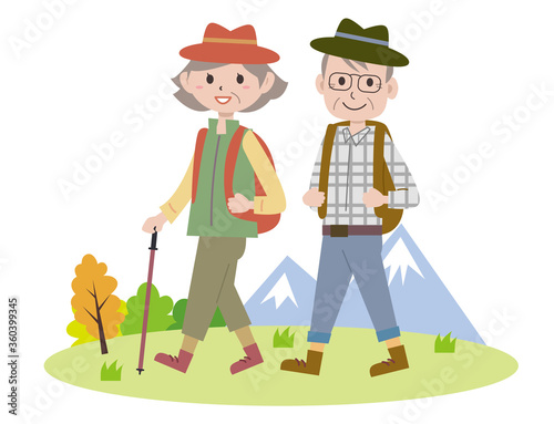 ハイキングをする老夫婦