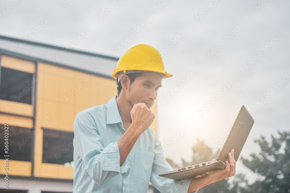 Businessman holding computer inspection construction building estate site Businessman holding computer inspection construction building estate site