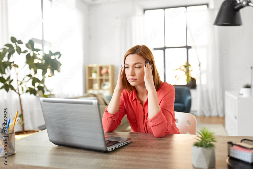 remote job, technology and people concept - tired or stressed young woman with laptop computer working at home office remote job, technology and people concept - tired or stressed young woman with laptop computer working at home office
