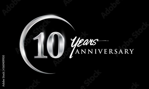 10th years anniversary celebration. Anniversary logo with silver ring elegant design isolated on black background, vector design for celebration, invitation card, and greeting card