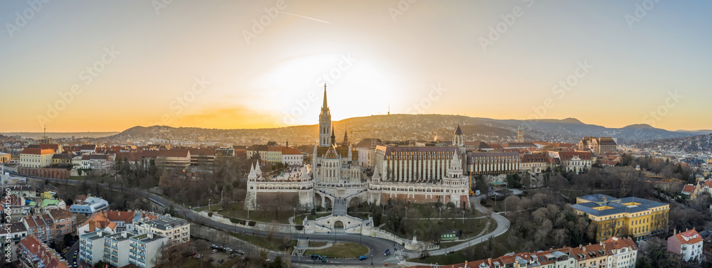Panoramic aerial drone shot of Fisherman's Bastion on Buda Hill in Budapest sunset