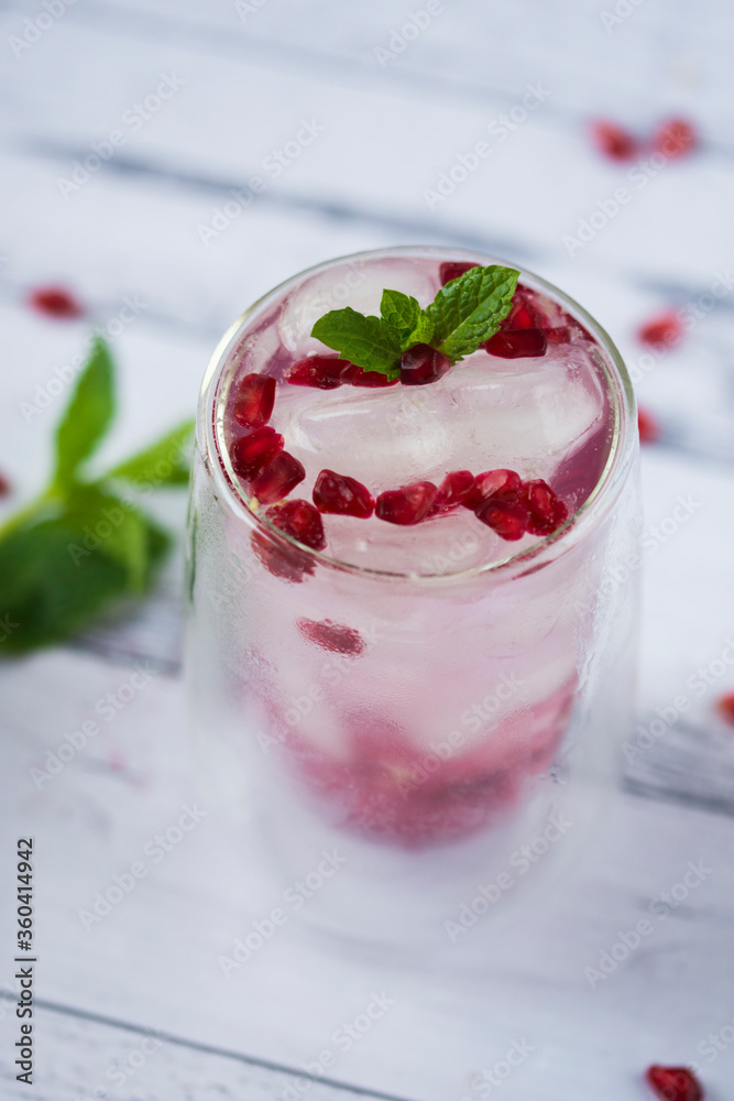Pomegranate cocktail. Summer light alcoholic drink. Pomegranate cocktail. Summer light alcoholic drink.