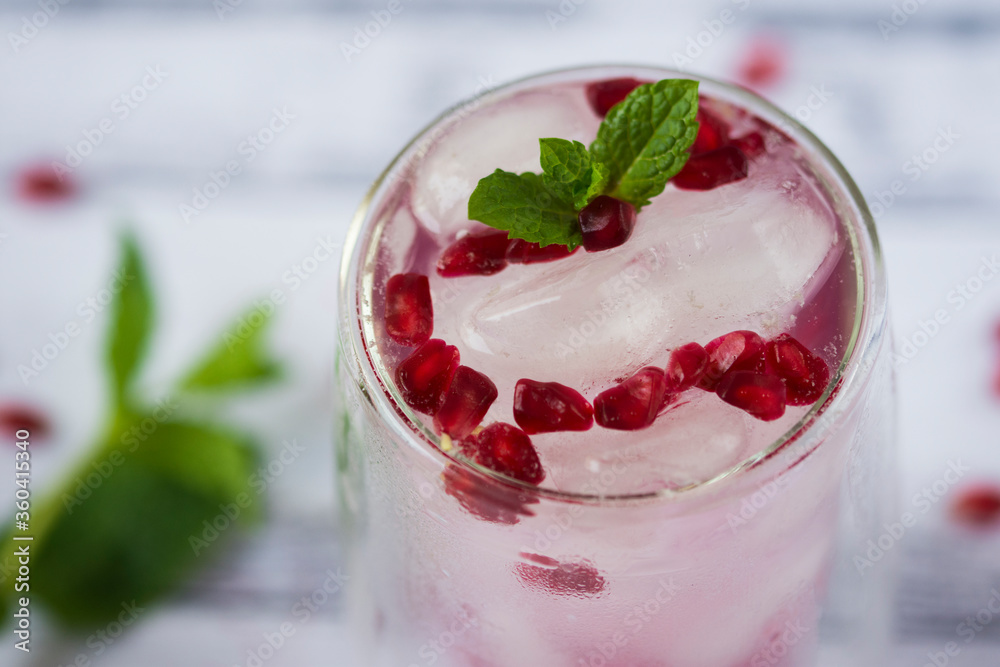 Pomegranate cocktail. Summer light alcoholic drink. Pomegranate cocktail. Summer light alcoholic drink.