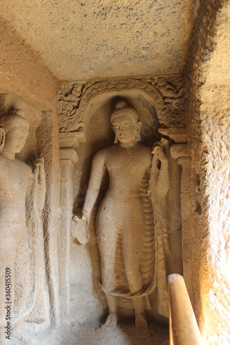 Interior of buddha Sculptures Inside the Kanheri Caves at Sanjay Gandhi National Park photo