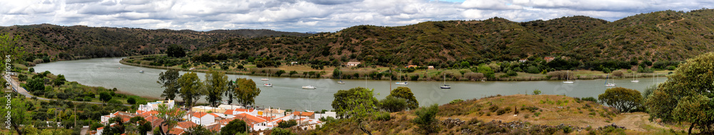The Guadiana marking the border between Portugal and Spain near the village Laranjeiras, Algarve, Portugal.