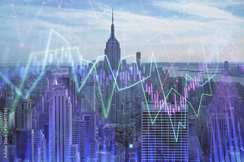 Forex graph on city view with skyscrapers background double exposure. Financial analysis concept.