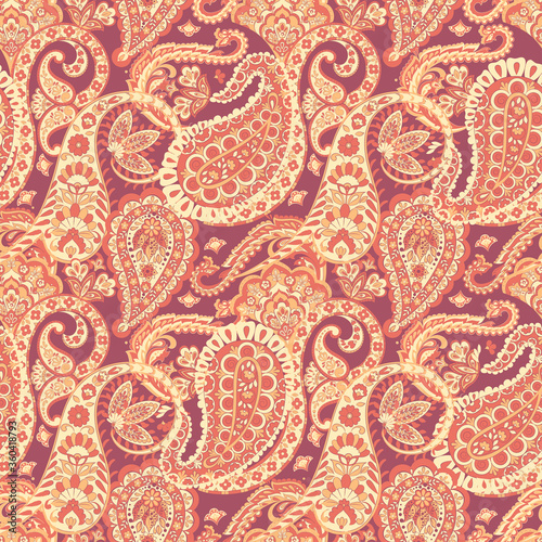 Paisley ethnic seamless pattern with floral elements.