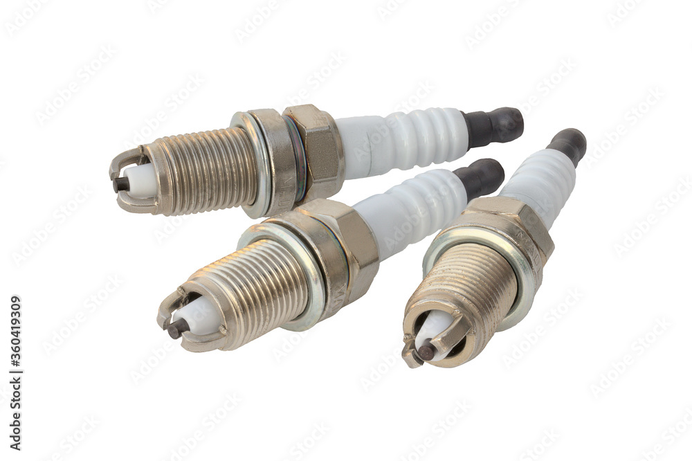 3 spark plugs on a white background. isolate 3 spark plugs on a white background. isolate