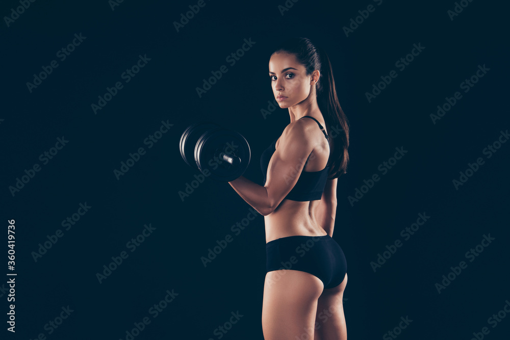 Fototapeta premium Portrait of gorgeous lady hold hand sports equipment want be slender isolated over black background