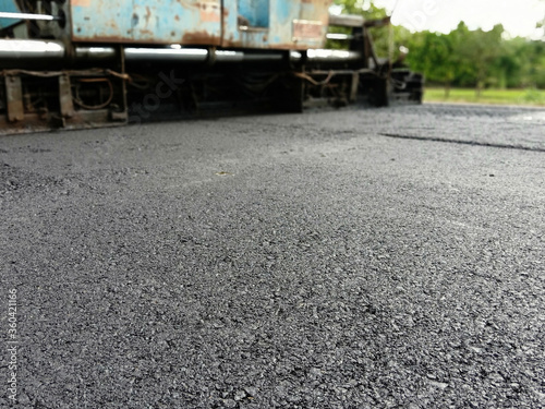 Blur image, asphalt paving With heavy machinery