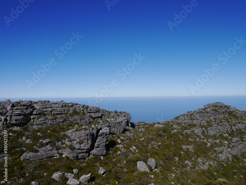 Blue horizon and rocky hills