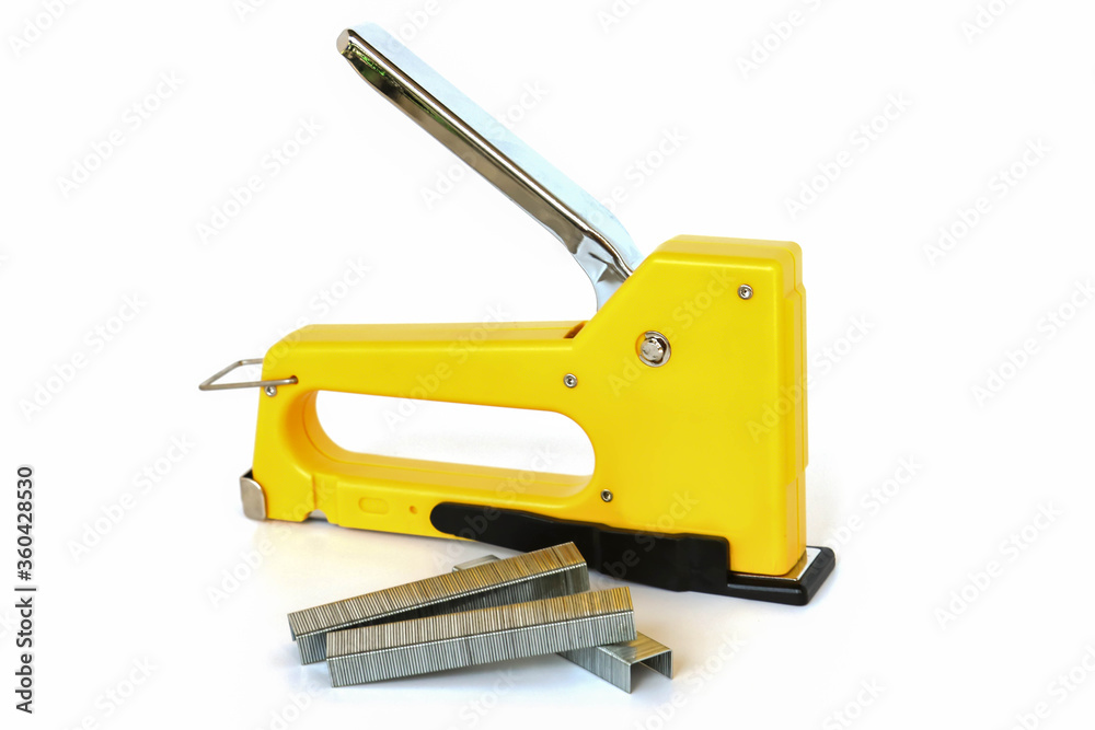 Stapler gun isolated on white background. Stapler gun isolated on white background.