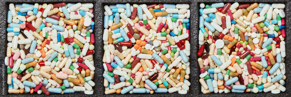Many colorful medicines drugs as a header background