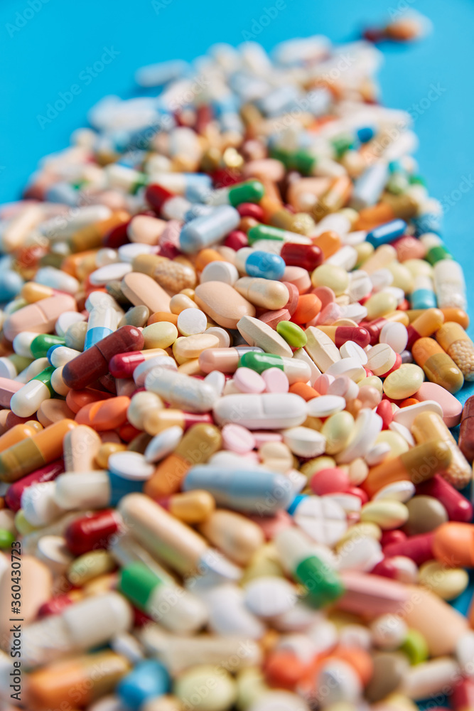Lots of colorful medicines drugs in a heap Lots of colorful medicines drugs in a heap