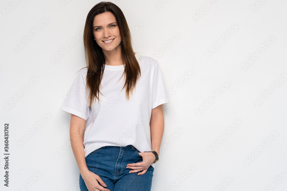 Funny woman on white background. Cheerful female model joyful. Positive human emotion facial expression body language Funny woman on white background. Cheerful female model joyful. Positive human emotion facial expression body language