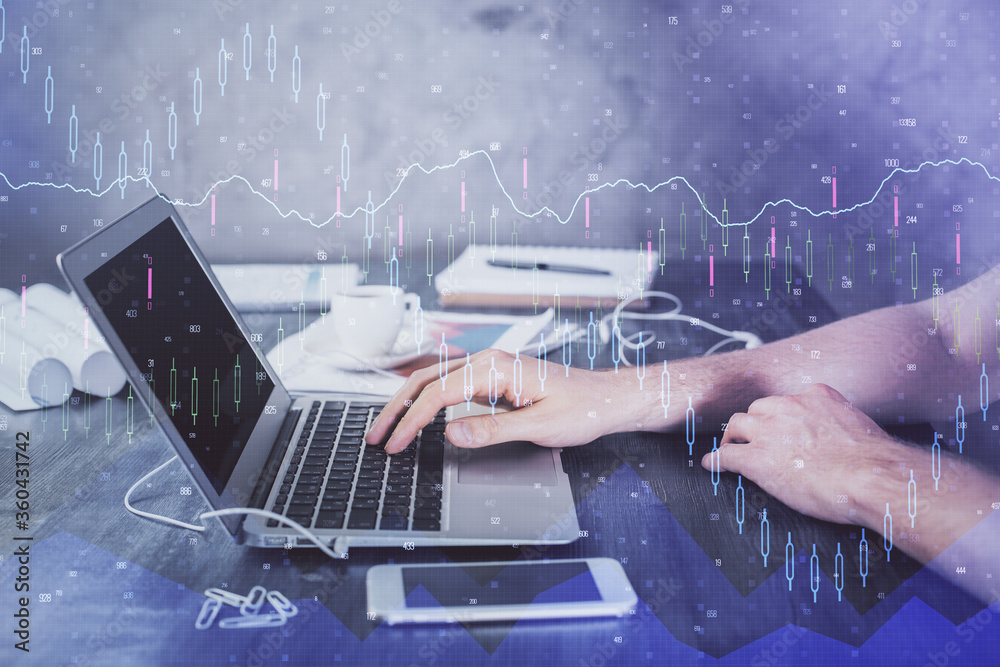 Double exposure of forex chart with man working on computer on background. Concept of market analysis. Double exposure of forex chart with man working on computer on background. Concept of market analysis.