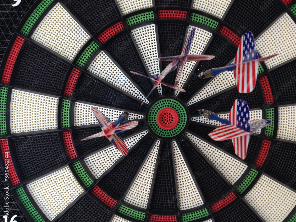 Bullseye darts dartboard with american and britain flag trade political allies concept Bullseye darts dartboard with american and britain flag trade political allies concept