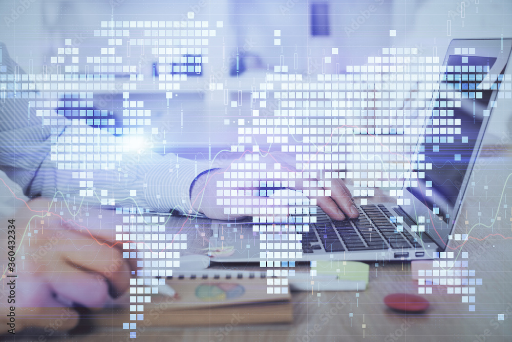 Multi exposure of businessman working on laptop on background. International business hologram in front. Concept of success. Multi exposure of businessman working on laptop on background. International business hologram in front. Concept of success.