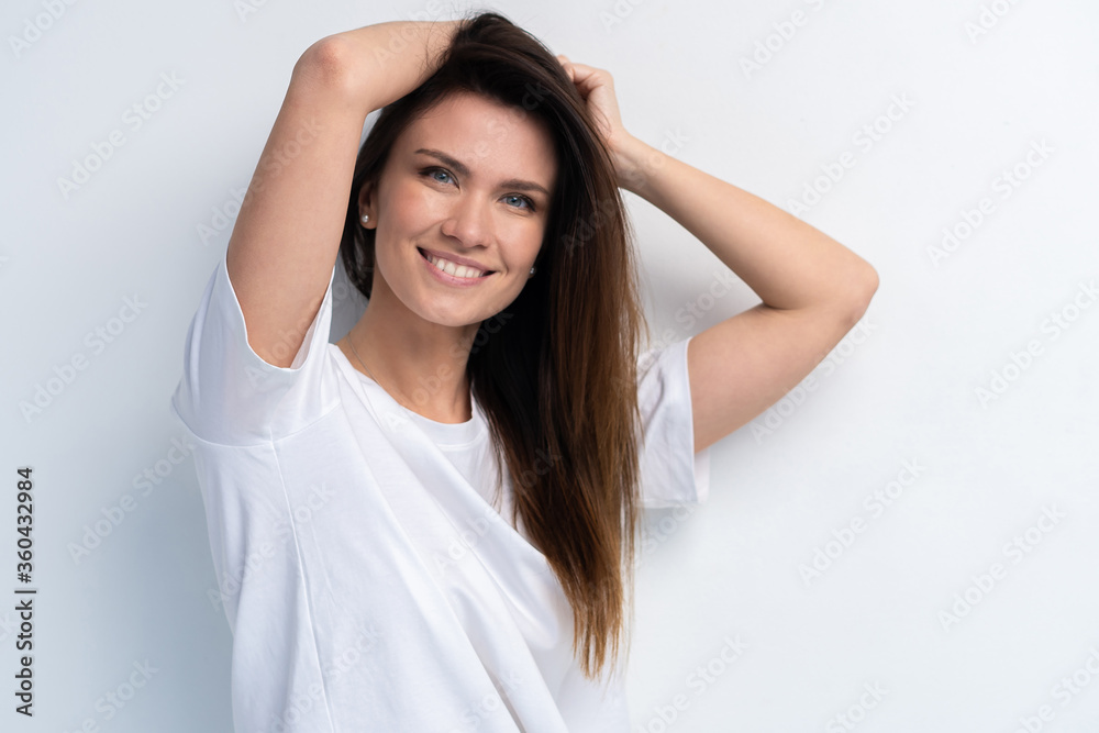 Funny woman on white background. Cheerful female model joyful. Positive human emotion facial expression body language Funny woman on white background. Cheerful female model joyful. Positive human emotion facial expression body language