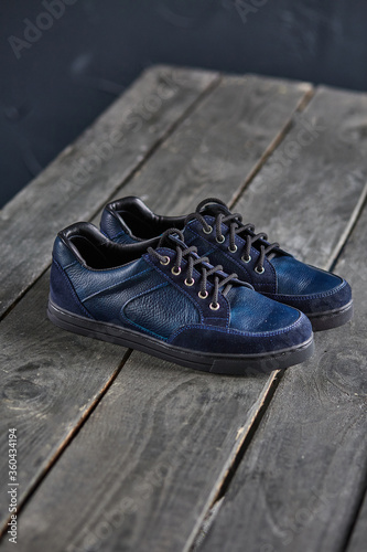blue shoes on a wooden