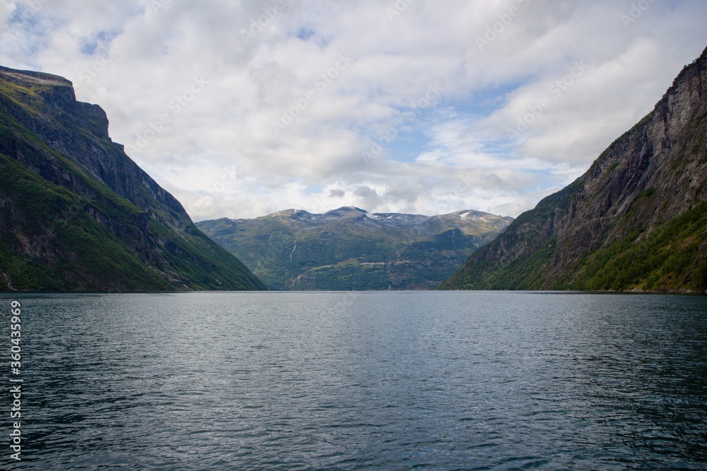 Scenic view of Geirangerfjord from boat trip through the fjord, Norway Scenic view of Geirangerfjord from boat trip through the fjord, Norway