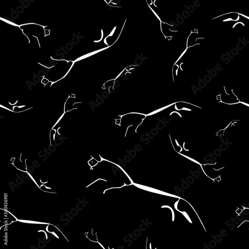 Prehistoric styalised horse art seamless repeat pattern in white on black background photo