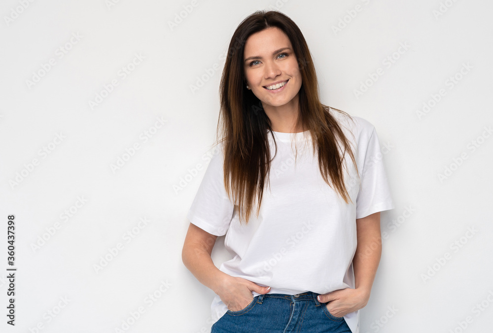 Funny woman on white background. Cheerful female model joyful. Positive human emotion facial expression body language Funny woman on white background. Cheerful female model joyful. Positive human emotion facial expression body language