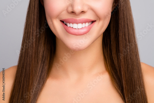 Closeup cropped photo of attractive lady nude shoulders plump perfect shape lips demonstrating ideal veneers toothy smile dentistry advert concept isolated grey color background photo