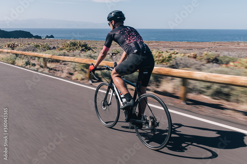 A cyclist on a mountain road