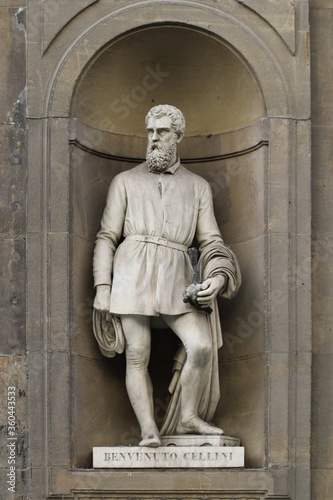 Statue of artist Benvenuto Cellini, outdoor the Uffizi museums, Florence, Italy, famous touristic place photo