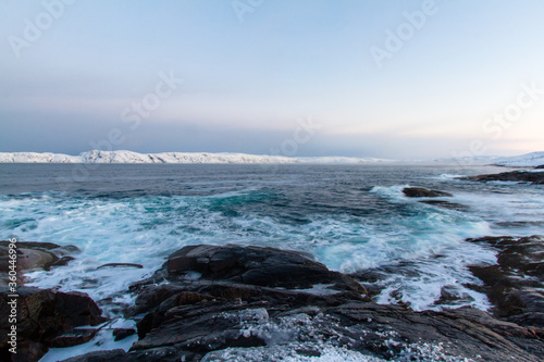 Winter view of the shore of the Arctic Ocean. General view of the day on the shore of the Arctic Ocean.