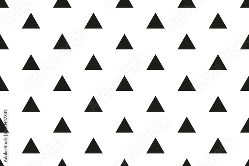 Small black triangles on a white background. Seamless texture.
